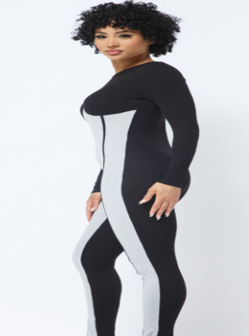 The Beyond Bae romper features a heather grey and black color blocking with a front contour outline. The back of the romper is solid black and has a lot of stretch so its safe to say this outfit is a slay.