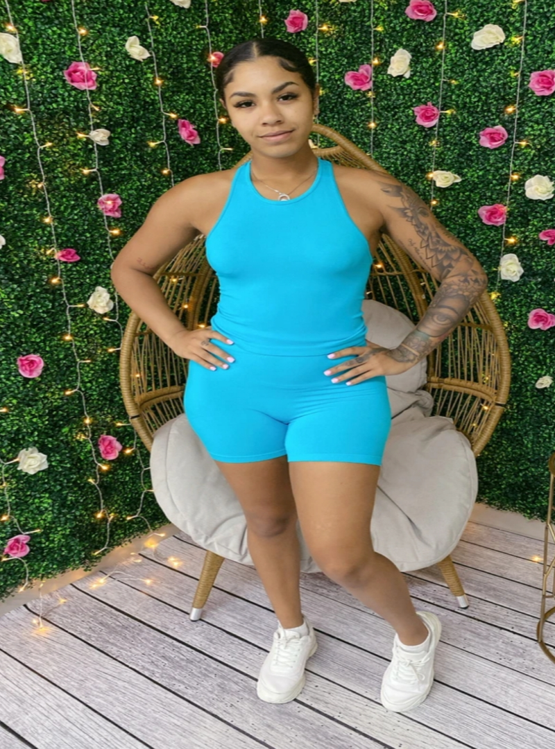 This is not your average short set. The Tiffany Blue two piece set includes a super soft racerback top and a seamless pair of shorts. The color of this set is clean and vibrant with an amazing amount of stretch.