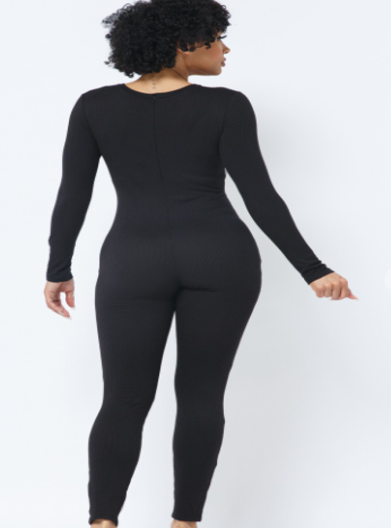 The Beyond Bae romper features a heather grey and black color blocking with a front contour outline. The back of the romper is solid black and has a lot of stretch so its safe to say this outfit is a slay.