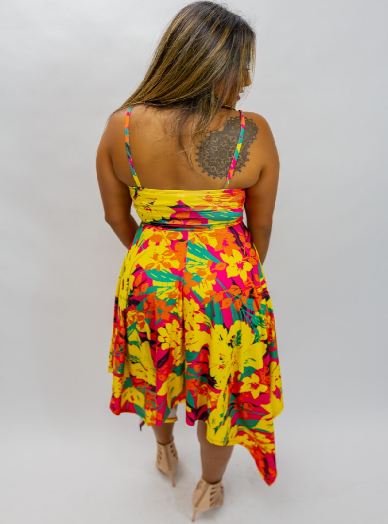 Our "Tropic Sunset Dress" is very vibrant  with details in rich color. It has excellent drape and a soft built-in lining at the bust. This piece has a charming appeal yet is very versatile & fun.