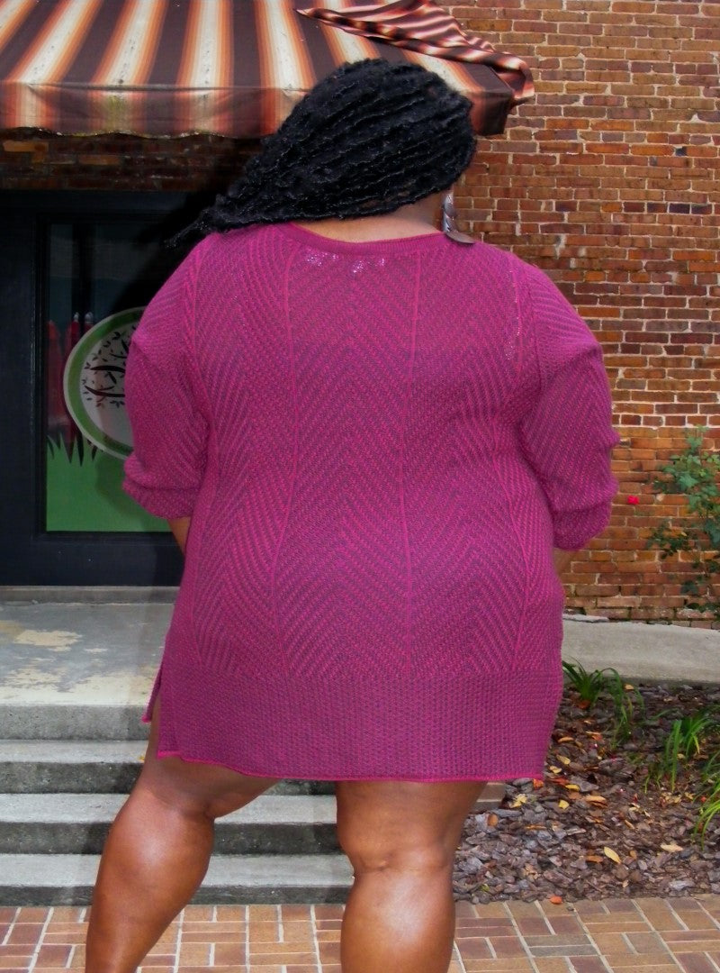 The Netari Sweater Tunic is one of our plus size pieces and is giving super versatile, it can be worn alone as a dress or as a tunic with jeans or leggings. Its berry color with navy blue highlights and 3 buttons detail is  just too good. Get it now before there gone.