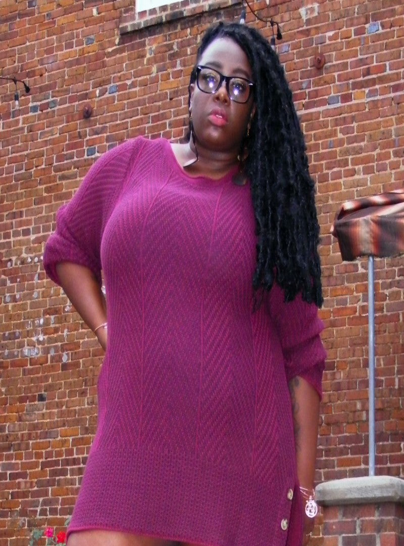 The Netari Sweater Tunic is one of our plus size pieces and is giving super versatile, it can be worn alone as a dress or as a tunic with jeans or leggings. Its berry color with navy blue highlights and 3 buttons detail is  just too good. Get it now before there gone.